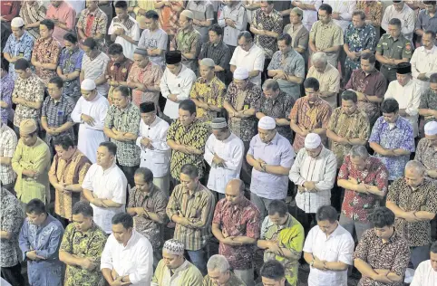  ?? EPA ?? Muslims pray inside the Istiqlal mosque during Friday prayers in Jakarta. Indonesia is launching a global campaign to repudiate the Islamic State’s extremist ideology head-on.