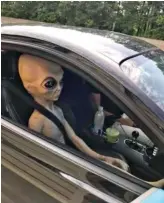  ?? ALPHARETTA DEPARTMENT OF PUBLIC SAFETY VIA AP ?? An alien figure sits in the passenger seat of a vehicle that was pulled over north of Atlanta.