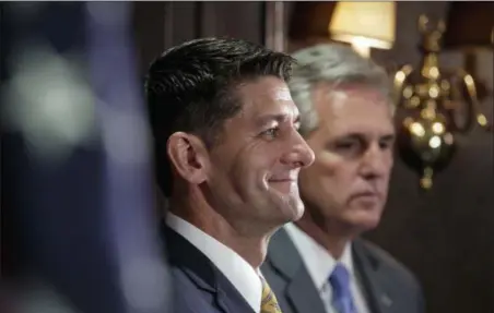  ?? J. SCOTT APPLEWHITE — THE ASSOCIATED PRESS ?? Speaker of the House Paul Ryan, R-Wis., joined at right by Majority Leader Kevin McCarthy, R-Calif., speaks following a closed-door Republican strategy session at Republican National Committee Headquarte­rs on Capitol Hill in Washington, Tuesday. The...