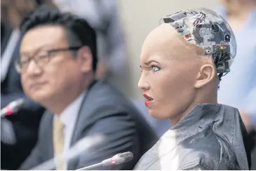  ?? EPA-EFE/SERGEY DOLZHENKO ?? The robot Sophia reacts during a press conference in Kiev, Ukraine, earlier this month. Sophia is the most advanced robot to date and was activated in February 2016 by Hanson Robotic Company.