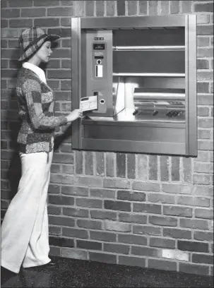  ?? The Associated Press ?? AUTOMATED TELLER MACHINE: In this photo provided by NCR of an image from a 1974 company announceme­nt, a woman uses an automated teller machine.