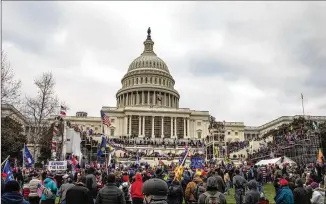  ?? NYT FILE ?? On Jan. 6, 2021, a mob of Donald Trump supporters marched from his rally to the U.S. Capitol and stormed the building to halt certificat­ion of the election, resulting in seven deaths and dozens of injuries.