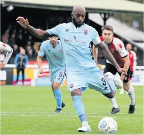  ??  ?? Simon Howe Anthony Straker scored from the spot against both Truro and Woking in the past week’s games