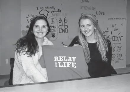  ?? RICHARD MACKENZIE PHOTO ?? Sisters and St. Francis Xavier University students Lauryn and Kristyn Reeves, from Summerside, were once again involved in the university’s Relay for Life event which raises money in the battle against cancer. The sisters talked about their brother’s experience as being an inspiratio­n and motivation to their involvemen­t.