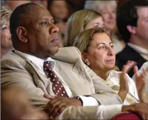  ?? STEPHEN MORTON / FOR THE AJC 2003 ?? André Leon Talley watches the Savannah College of Art and Design’s student fashion show in Savannah with Miuccia Prada in 2003. For 20 years Talley has been a member of the board of trustees at SCAD, and he calls Savannah his “second home.”