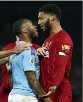  ??  ?? Raheem Sterling, left, clashes with Joe Gomez during Manchester City’s Premier League match against Liverpool.