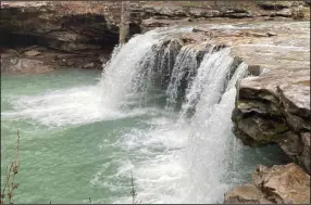  ?? (Arkansas Democrat-Gazette/Bryan Hendricks) ?? Falling Water Falls is a signature landmark on the road to Richland Creek Campground.