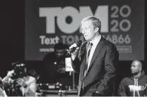  ?? Sean Rayford / Getty Images ?? Tom Steyer announces the suspension of his campaign Saturday in South Carolina, where he finished third in the primary.