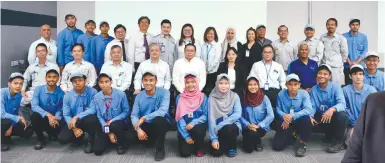  ??  ?? Ready for the future ... Daikin Malaysia apprentice­s with (second row, from third left) Tan, Ooi, Fang, Lee, Yeow and Chandraseg­aran at the graduation ceremony.