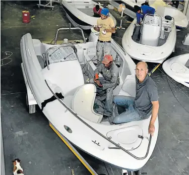  ??  ?? FROM SCRATCH: Blake Rubidge’s bustling Indigo Boats factory in Walmer Dunes Industrial Park