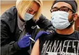  ??  ?? Hitesh Dash, 31, gets the Moderna vaccine from Alyssa Gonzalez, 34, at the Wellmed site. In Bexar County, only 25,512 J&J shots have been given.