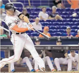  ?? MIKE EHRMANN/GETTY IMAGES ?? Giancarlo Stanton hit his 30th home run of the season in the first inning on Wednesday. It was the third straight game he did that against the Philadelph­ia Phillies.