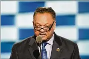  ??  ?? The Rev. Jesse Jackson speaks at the Democratic National Convention in Philadelph­ia in July 2016. Jackson, a confidante of civil rights icon Martin Luther King Jr., delivered a sermon at Atlanta’s Ebenezer Baptist Church.
