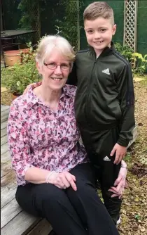  ??  ?? Noreen Lewis, 67, noticed something when Aidan, 8, hugged her