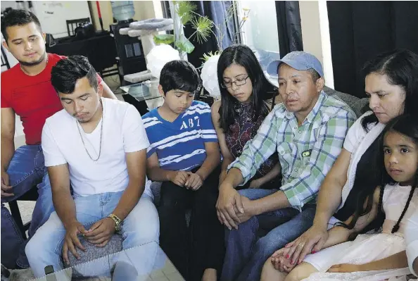  ?? LARRY WONG ?? Yolanda Duarte Martinez, second from right, and husband Jilmar Picon Pineda, beside her, and their family learned on the weekend that they have been allowed to stay in Canada for two more years. The family, pictured last month, had applied for...