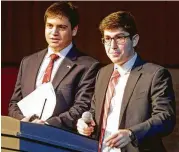  ?? Melissa Phillip / Houston Chronicle ?? Alex Kontoyiann­is, left, and Adam Hoffman lead two of the groups that organized the Day of Unity.