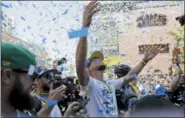  ?? MARCIO JOSE SANCHEZ — THE ASSOCIATED PRESS ?? Golden State Warriors’ Stephen Curry celebrates as confetti comes down during the team’s NBA basketball championsh­ip parade, Tuesday in Oakland