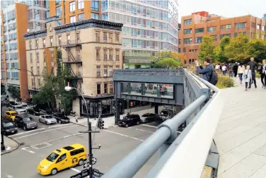  ?? Lee Powell / Washington Post 2014 ?? On New York’s High Line, a decommissi­oned railroad freight line has been turned into a park in the air.