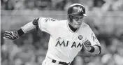  ?? MATIAS J. OCNER mocner@miamiheral­d.com ?? Miami Marlins’ Ichiro Suzuki makes a run for first base at Marlins Park in Little Havana in a 2017 home game.
