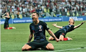  ??  ?? Apesar de novo sofrimento, os croatas expressara­m o seu contentame­nto