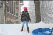  ?? PHOTO SUBMITTED BY KERRY KLINE ?? Sledding down the hill at Rupert Elementary School in Pottstown is a tradition after a heavy snow.