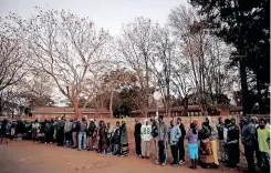  ?? | Reuters ?? ZIMBABWEAN voters queue to cast their ballots in the country’s general elections in Harare, Zimbabwe. To believe that a politician can suddenly be endowed with a heart to care about your personal and social needs defeats logic, the writer says.