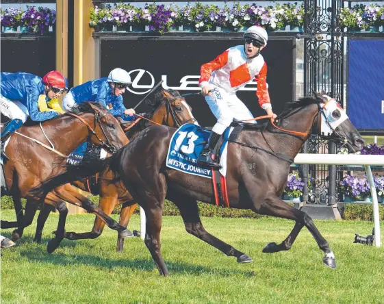  ?? Picture: Getty Images ?? Tasmanian mare Mystic Journey wins the All-Star Mile at Flemington last year when she was at the peak of her form.