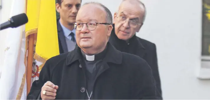  ??  ?? ► El arzobispo maltés Charles Scicluna junto al nuncio Ivo Scapolo durante su última visita a Chile en junio pasado.