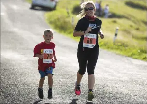  ?? Pics: ?? Enjoying the Mullaghmor­e Race/Walk. Donal Hackett.