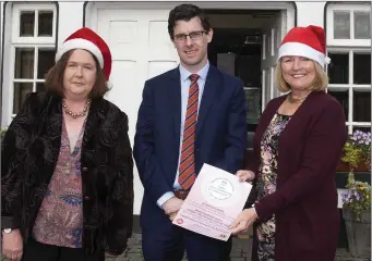  ??  ?? Carmel McBride, Gerard O’Brien and Imelda Riley launching Arklow Lions Club’s Christmas fundraisin­g appeal and Ladies’ Little Christmas lunch at the Woodenbrid­ge Hotel.