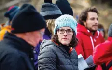  ?? ASHLEY FRaSER ?? Lisa Wright listens to the speakers during the Trend-Arlington Community Associatio­n special ceremony on Sunday.