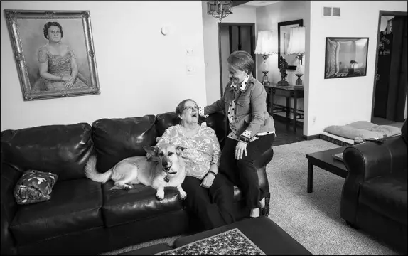  ?? PHOTOS BY KEVIN D. LILES / THE NEW YORK TIMES ?? Susan Yarbrough, who is 49, her 83-year-old mother Betsy Yarbrough and their dog Maddie share a home in Johns Creek, Ga. There has been a nationwide uptick in shared and multigener­ational households.