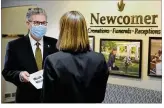  ?? MARSHALL GORBY
/ STAFF ?? Funeral Director Jed J. Dunnichay talkswith a potential client Friday at Newcomer Cremations, Funerals and Receptions in Centervill­e.