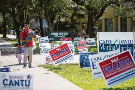  ?? Marie D. De Jesus / Houston Chronicle ?? Campaign signs for Saturday’s special election for the District K City Council seat left open after the death of Larry Green dot the landscape in front of the Leiv & Betty Platou Community Center.