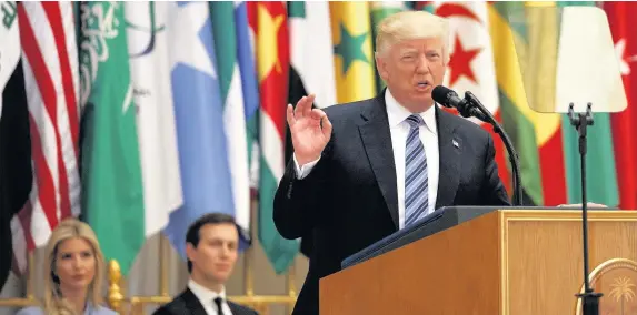  ??  ?? > Donald Trump delivers a speech to the Arab Islamic American Summit at the King Abdulaziz Conference Center in Riyadh, Saudi Arabia, yesterday