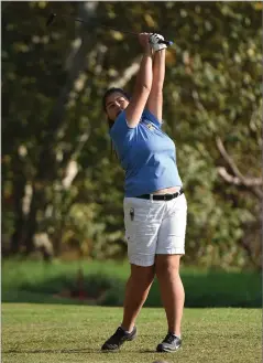  ?? RECORDER PHOTO BY CHIEKO HARA ?? Monache High School’s Abby Choi tees off on the second hole Thursday during a match against Portervill­e High School at River Island Country Club.