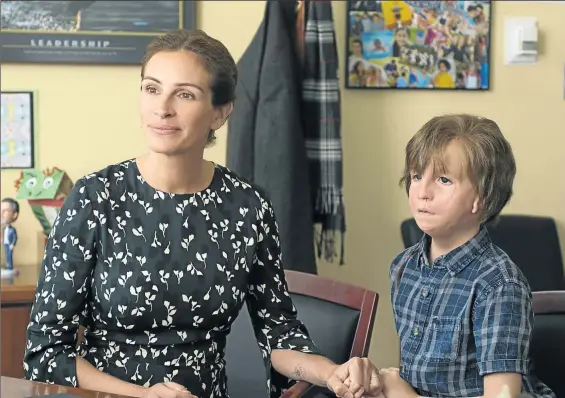  ??  ?? Julia Roberts and Jacob Tremblay are mother and son in ’Wonder’, a film about a boy with a disfigurin­g genetic condition.