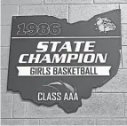  ?? ROB OLLER/COLUMBUS DISPATCH ?? The South girls 1986 championsh­ip was the first title for the school's basketball teams since the boys won in it all in 1965.