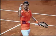  ?? (AFP) ?? Serbia’s Novak Djokovic celebrates after defeating Canada’s Felix Auger-Aliassime during their quarter final of the ATP Rome Open at Foro Italico in Rome on Friday.