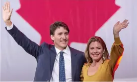  ?? Photograph: Ryan Remiorz/AP ?? Liberal leader Justin Trudeau celebrates with his wife, Sophie Gregoire Trudeau, after winning a narrow victory to form a minority government.