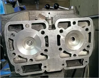  ??  ?? RG400 head being machined to 470cc: left is finished right is standard.