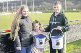  ??  ?? Kacey, left, Lily Rae and Toby helped with a collection at Avonmouth’s game against Coney Hill on Saturday, which was for Sandra Martin, wife of former Avonmouth player Kevin, who died recently