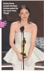  ?? ?? Emma Stone accepts the Best Actress award for her role in ‘Poor Things’