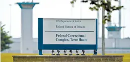  ?? MICHAEL CONROY/AP ?? The Federal Bureau of Prisons has carried out eight federal executions this year after a 17-year hiatus. Above, a sign for the federal correction­al complex in Terre Haute, Indiana.