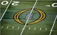  ?? ROGER STEINMAN — THE ASSOCIATED PRESS FILE ?? The College Football Playoff logo is shown on the field at AT&T Stadium before the Rose Bowl NCAA college football game between Notre Dame and Alabama in Arlington, Texas, Jan. 1, 2021.