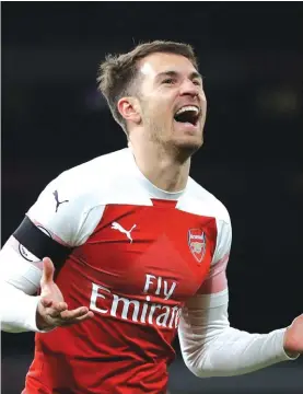  ??  ?? Aaron Ramsey celebratin­g a goal when he was still an Arsenal player Photo: AP
