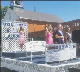  ?? PILOT NEWS FILE PHOTO ?? 2019 Blueberry Festival Queen Abigail Powell stands at the back of the Blueberry Court float in the Bourbon Summerfest Parade on Aug. 10. She’s joined by first runner up Mary Yeo, second runner up Delanie Groves and Miss Friendship Ally Dolan.