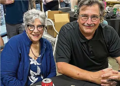  ?? ?? Joni Watson (left) sits with husband Ralph Watson. The day after they were married in 1986, Watson began her teaching career with Dayton Public Schools as an art teacher.