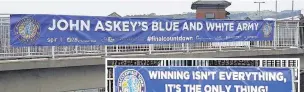  ??  ?? Jason Carpenter’s Macc Town banners are designed to give the Silkmen a lift