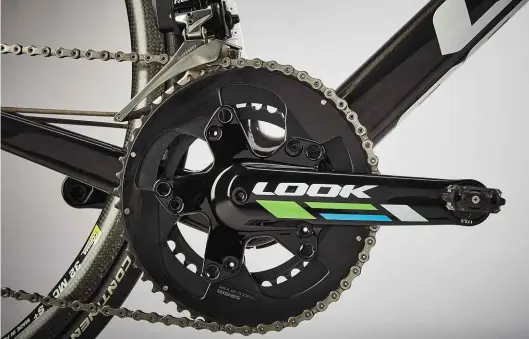  ??  ?? CRANKSET Look’s ZED 2 one-piece crankset can be fed through Look’s specific bottom bracket without the need to be split at the centre. The threaded pedal inserts can also be rotated into three separate positions to achieve a crank length of 170, 172.5...